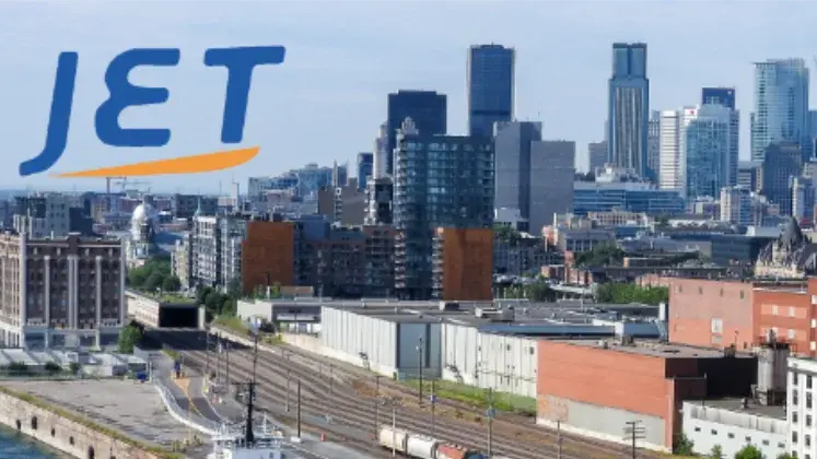 Skyline of Montreal with the jet ship worldwide logo